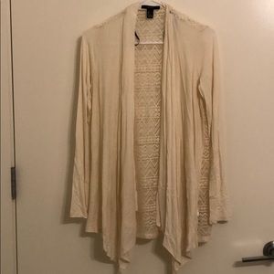 Cream colored cardigan with lace design back